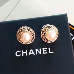 Chanel logo big pearl round stud earrings